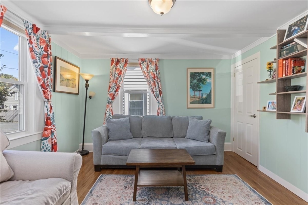 9 John Street Waltham, MA 02453 - Photo 9 of 43 a living room with furniture and a window