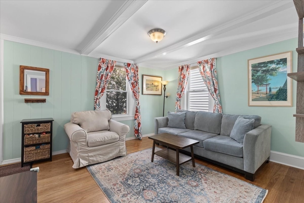 9 John Street Waltham, MA 02453 - Photo 10 of 43 a living room with furniture and a window