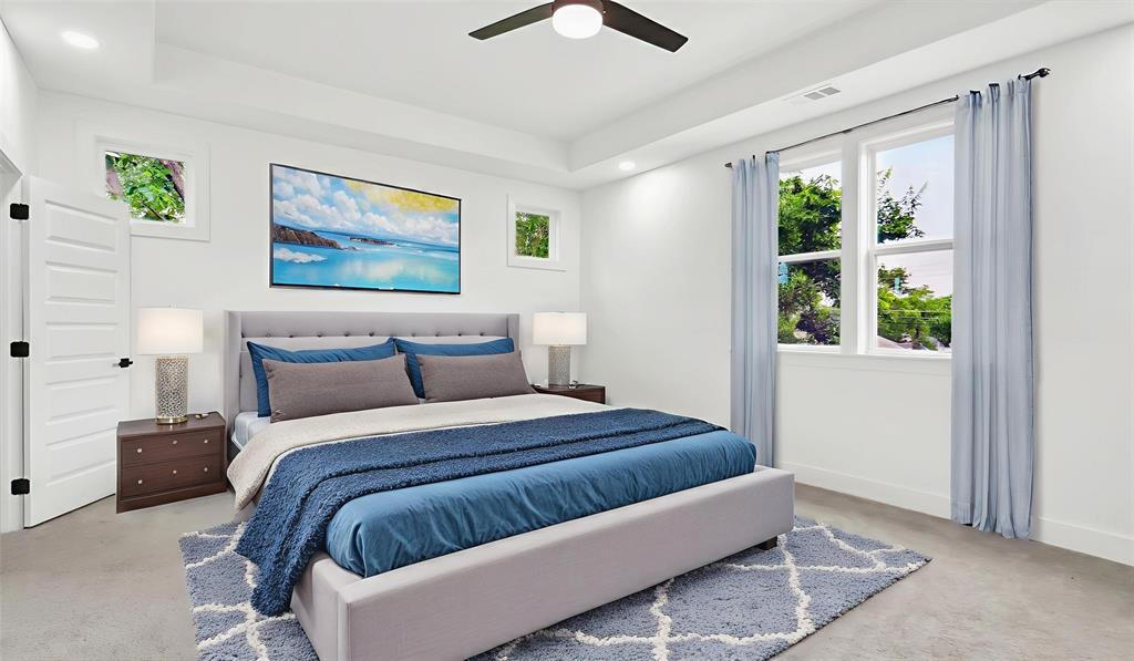 3311 Rutz Street Dallas, TX 75212 - Photo 3 of 21 a bedroom with a bed and a painting on the wall