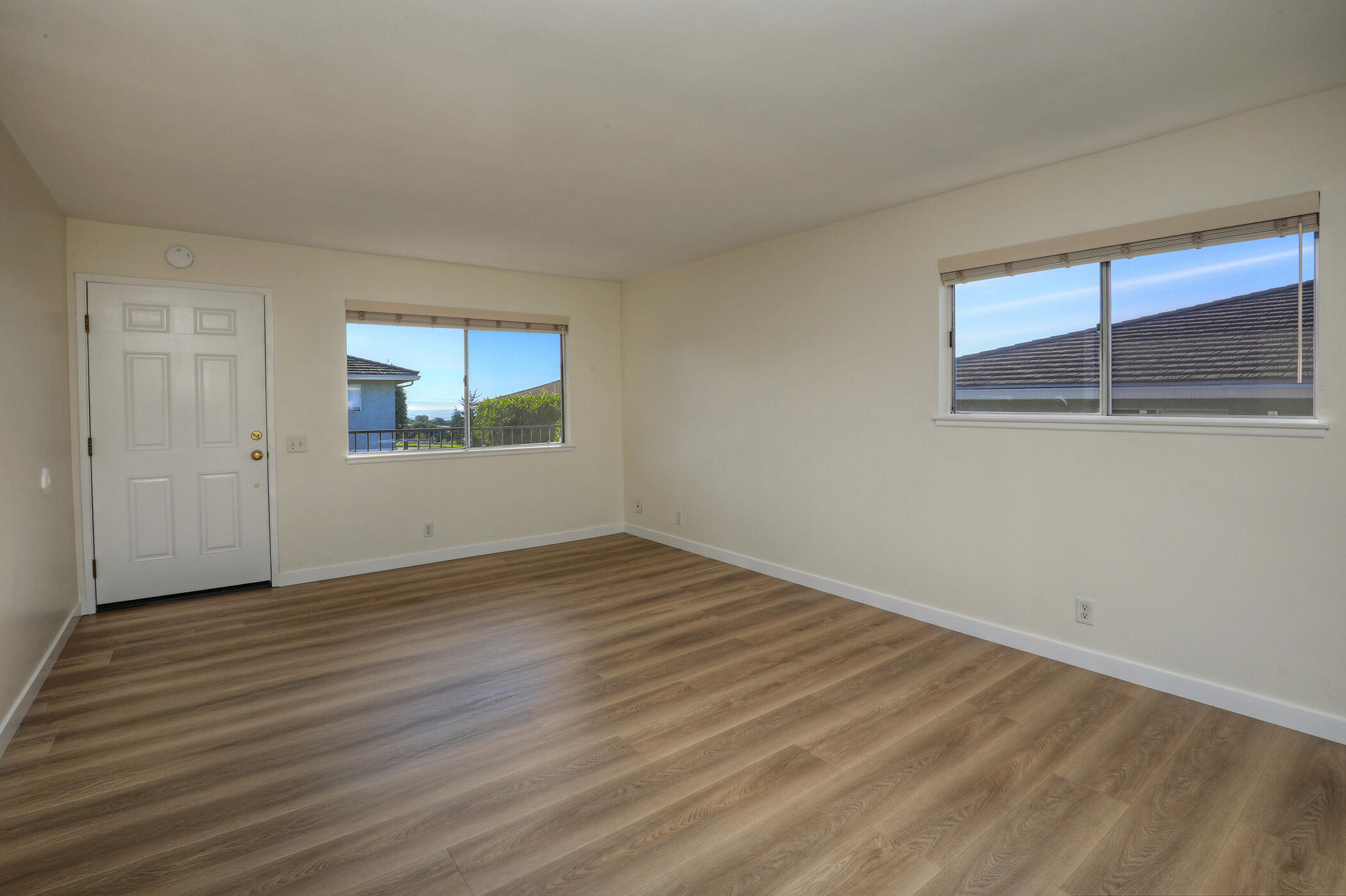 5945 Hickory Street, Unit 4 Carpinteria, CA 93013 - Photo 2 of 19 a view of empty room with wooden floor and fan