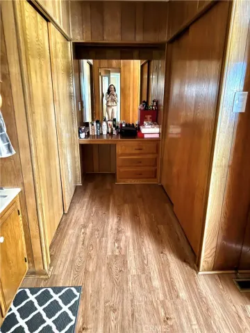 a living room with fireplace furniture and floor to ceiling window