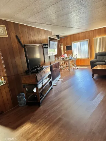 a kitchen with a dining table and chairs