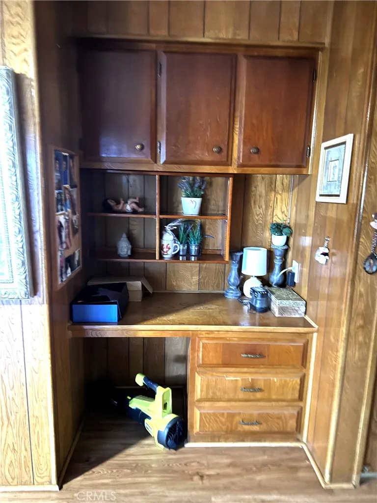 1560 Massachusetts Avenue, Unit 46 Riverside, CA 92507 - Photo 9 of 18 a kitchen with a sink and a stove top oven