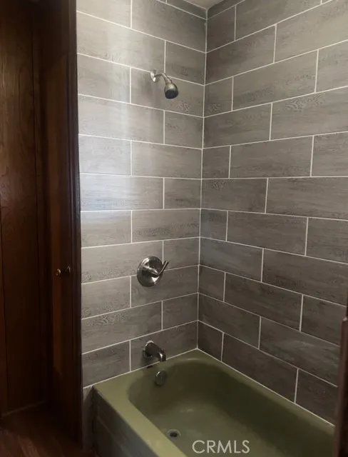1560 Massachusetts Avenue, Unit 46 Riverside, CA 92507 - Photo 10 of 18 a bathroom with a shower
