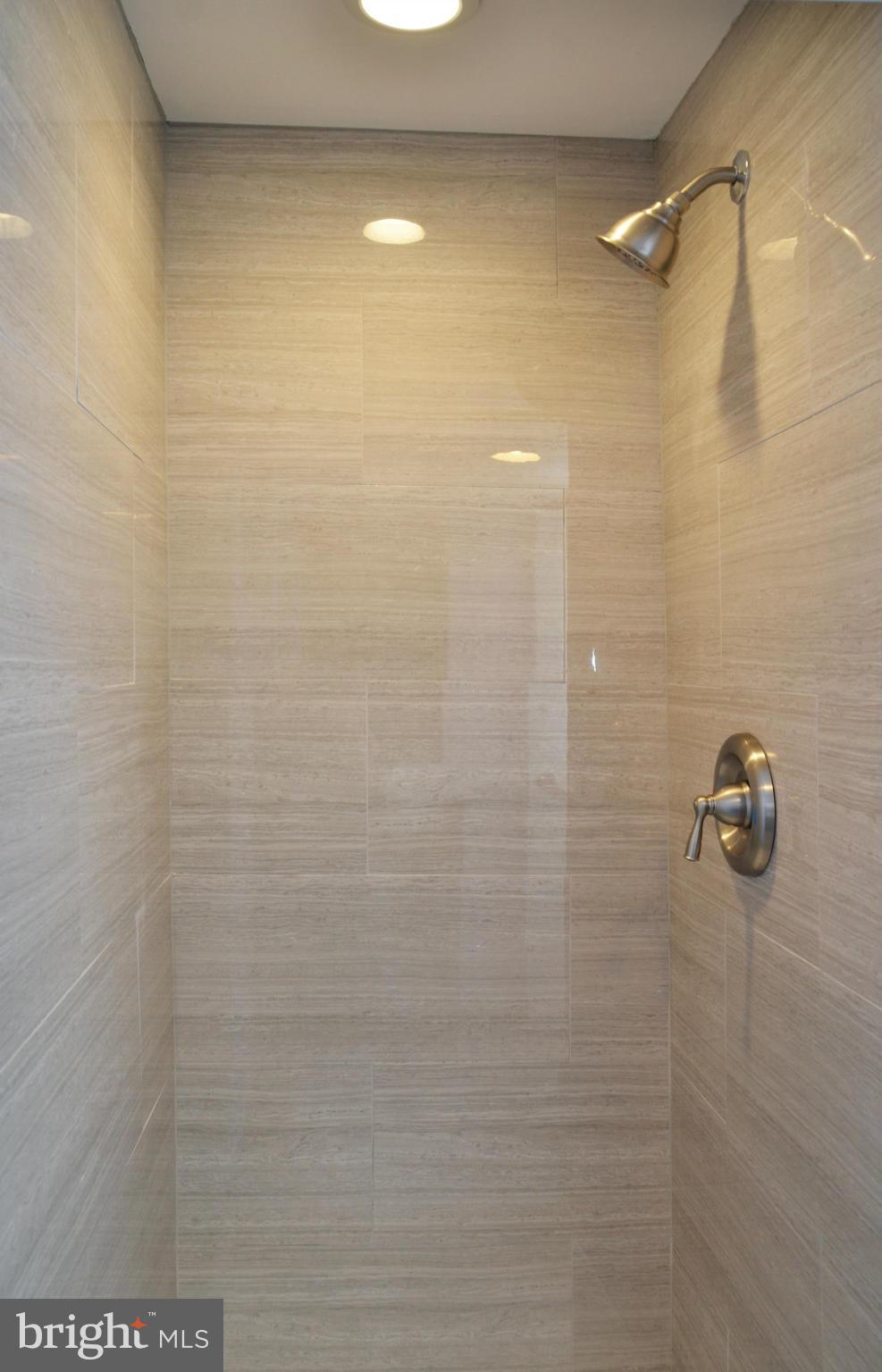 9710 Holmhurst Road Bethesda, MD 20817 - Photo 14 of 18 a bathroom with a shower