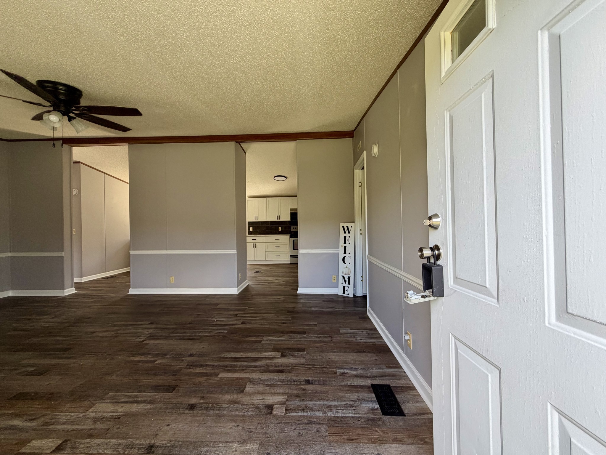 191 Buffalo Road Carthage, TN 37030 - Photo 6 of 42 a view of a hallway with wooden floor and staircase