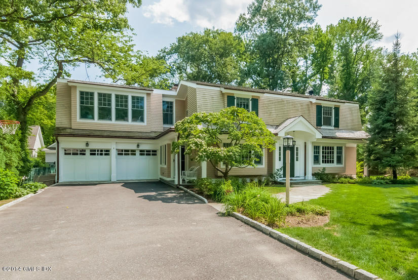 18 Hidden Brook Road Riverside, CT 06878 - Photo 1 of 32 front view of a house with a yard