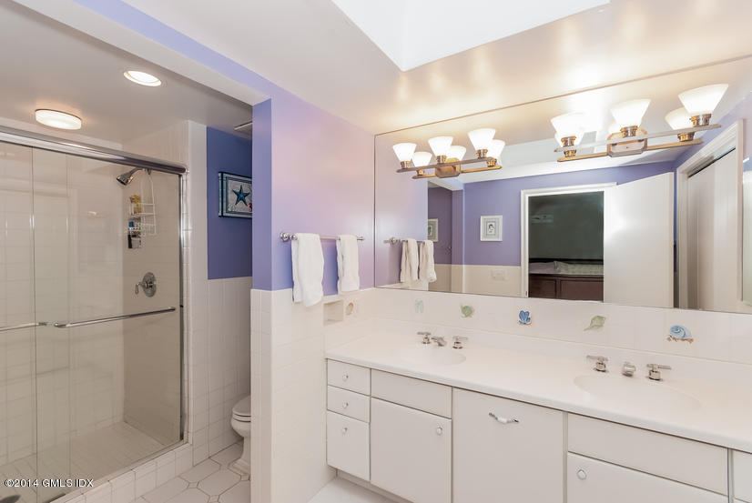 18 Hidden Brook Road Riverside, CT 06878 - Photo 15 of 32 a bathroom with a sink vanity and mirror