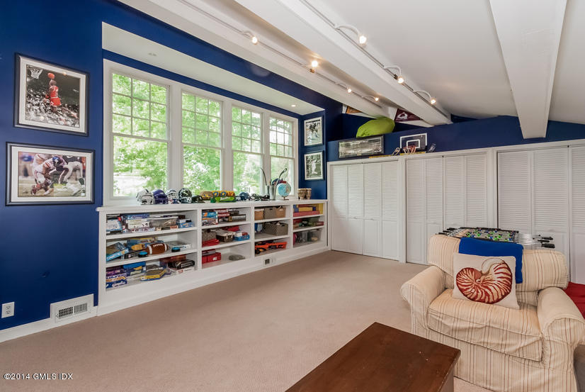 18 Hidden Brook Road Riverside, CT 06878 - Photo 23 of 32 a room with furniture and a large window