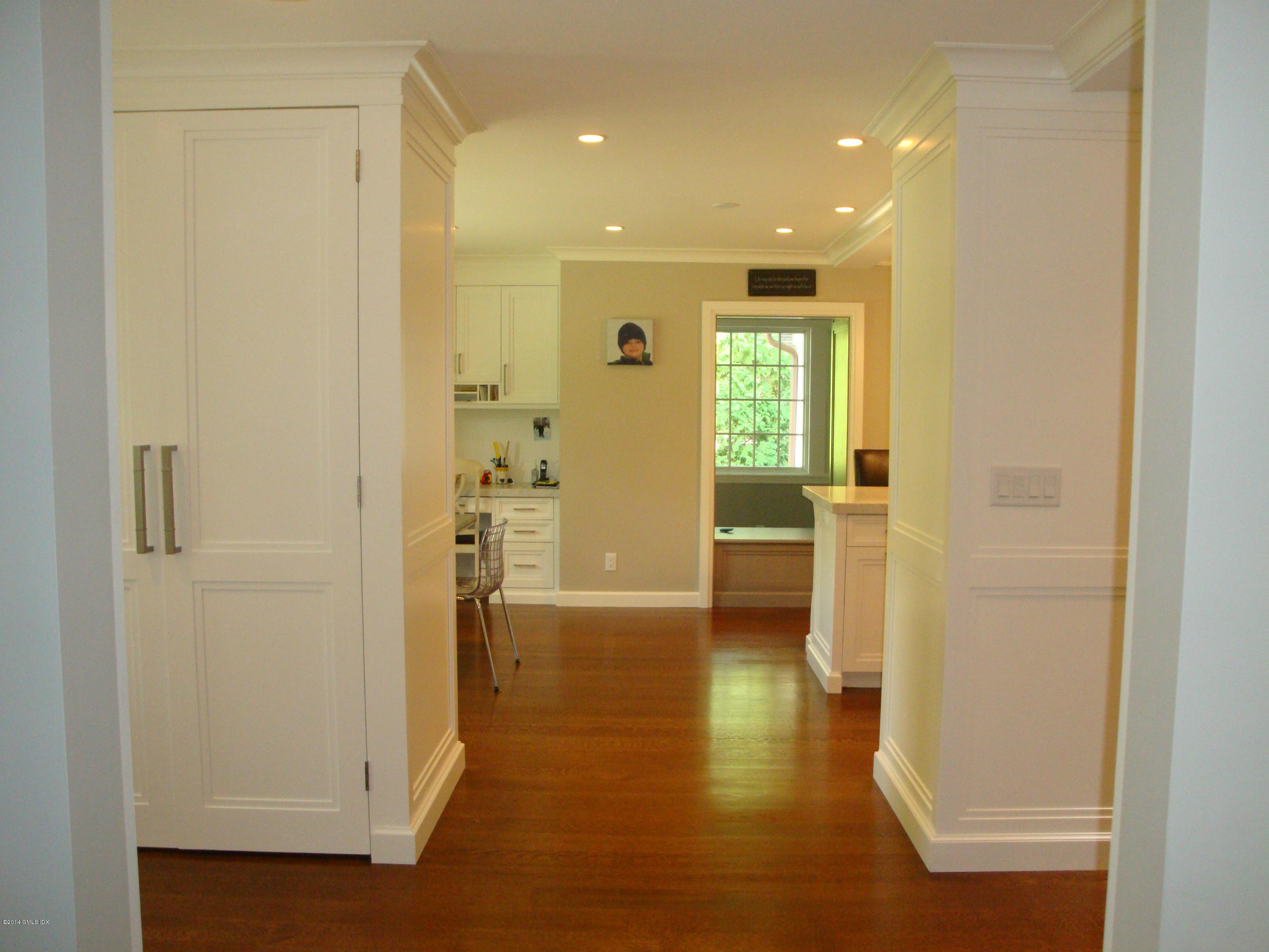 18 Hidden Brook Road Riverside, CT 06878 - Photo 6 of 32 a view of a hallway with wooden floor windows and bathroom