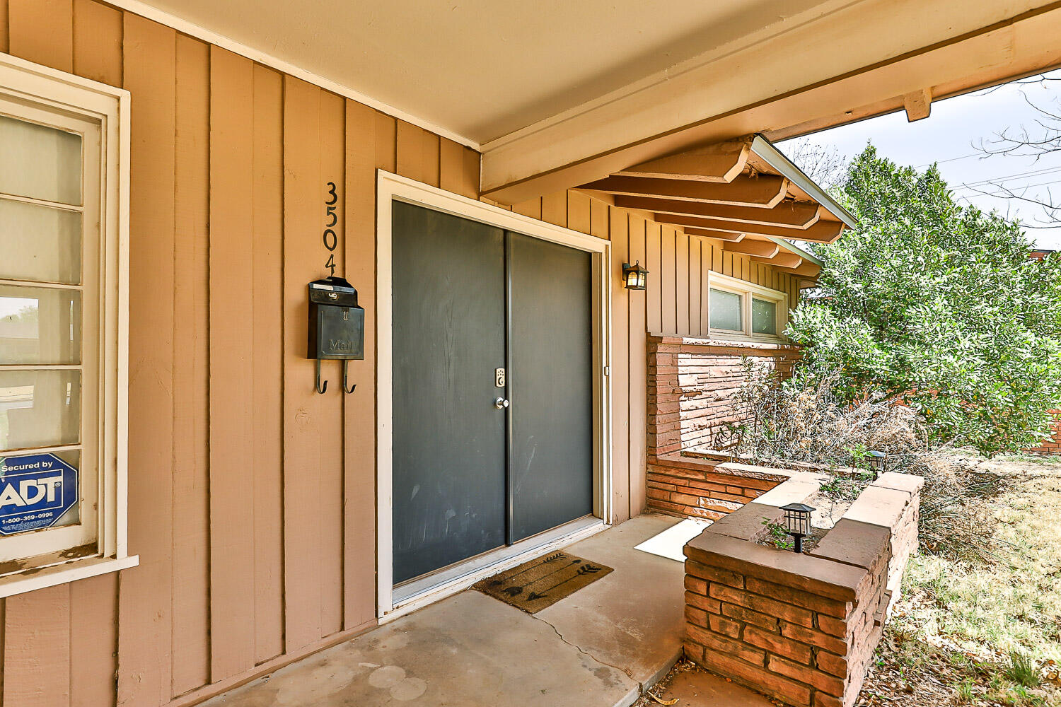 3504 38th Street Lubbock, TX 79413 - Photo 2 of 28 a backyard of a house with sofas