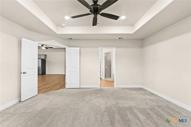 a view of an empty room and window