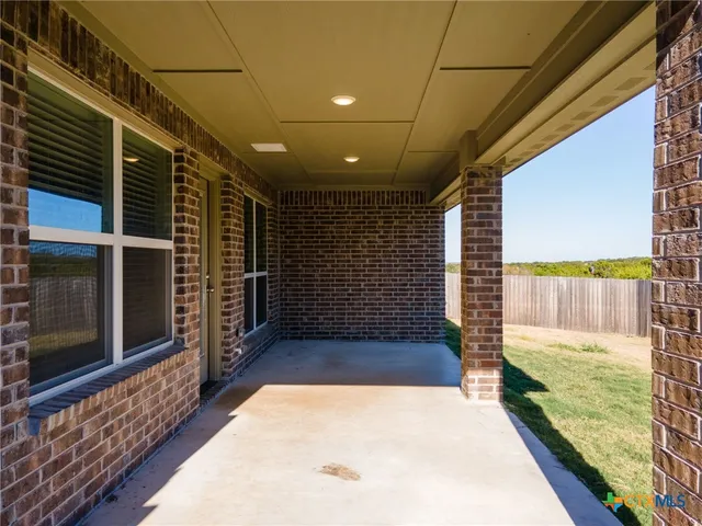 a view of an entryway door the house