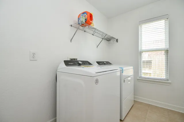 a view of a kitchen with a stove cabinets and a kitchen