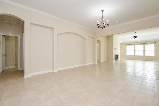 a view of a livingroom with a kitchen