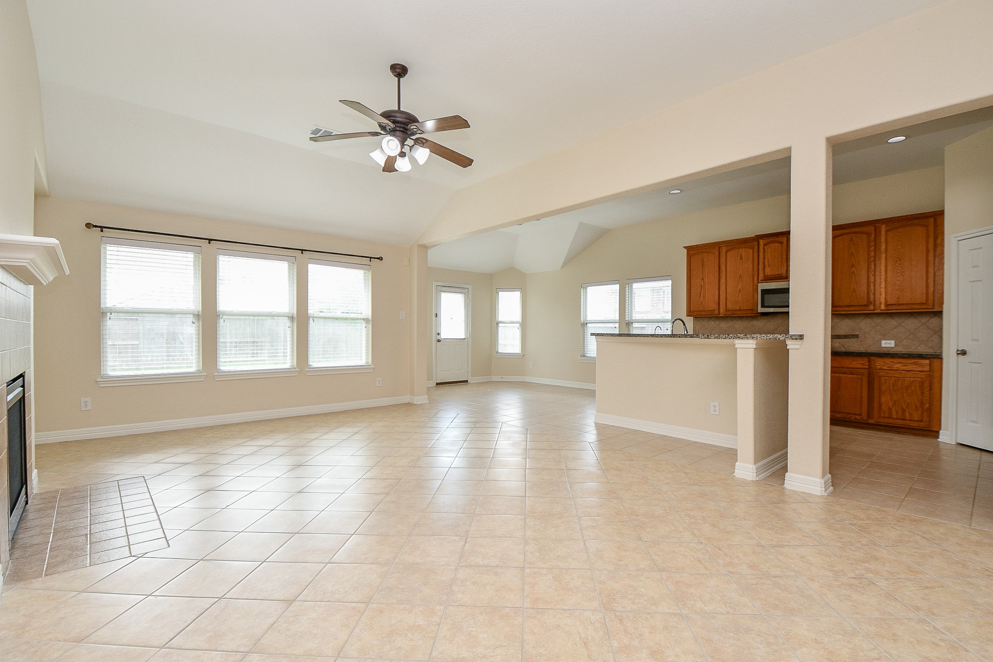 12104 Dawn Mist Court Pearland, TX 77584 - Photo 18 of 31 a view of a kitchen with a stove cabinets and a kitchen