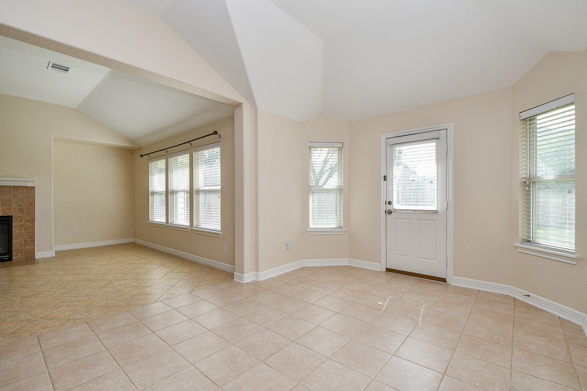 12104 Dawn Mist Court Pearland, TX 77584 - Photo 20 of 31 a view of an empty room with a window