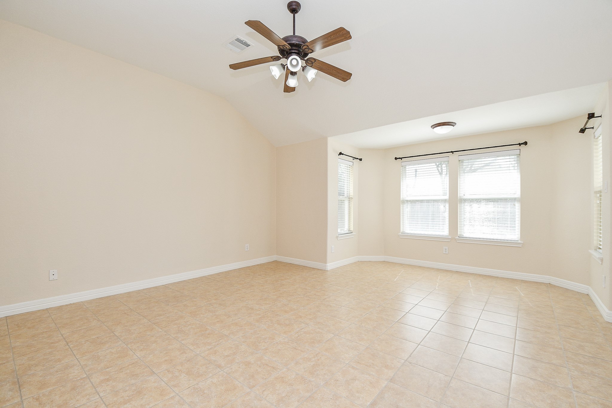 12104 Dawn Mist Court Pearland, TX 77584 - Photo 27 of 31 a view of an empty room with a window