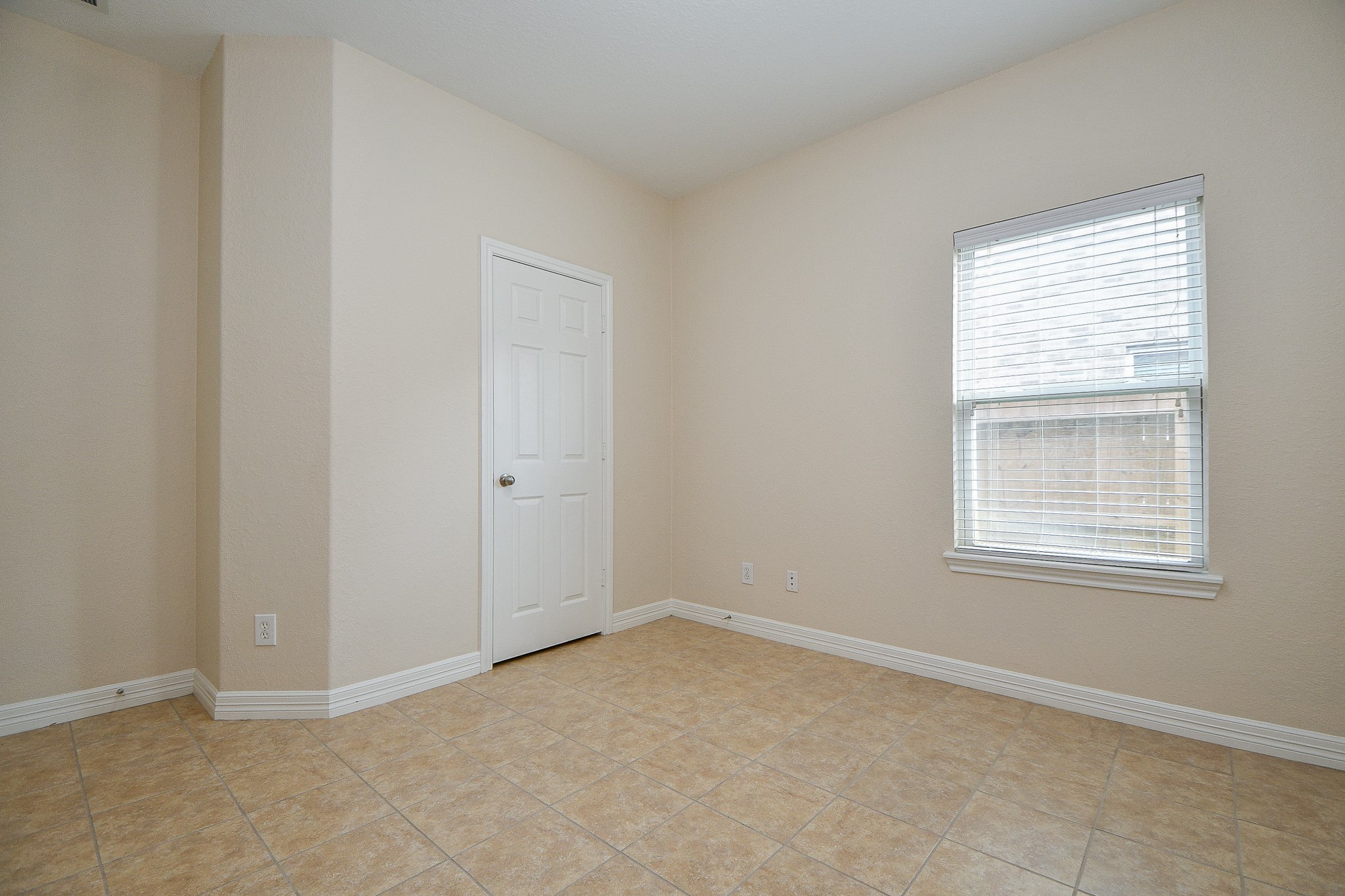 12104 Dawn Mist Court Pearland, TX 77584 - Photo 10 of 31 an empty room with windows