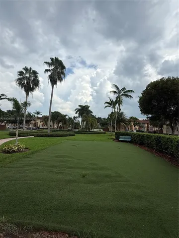 a view of a lake and houses with outdoor space