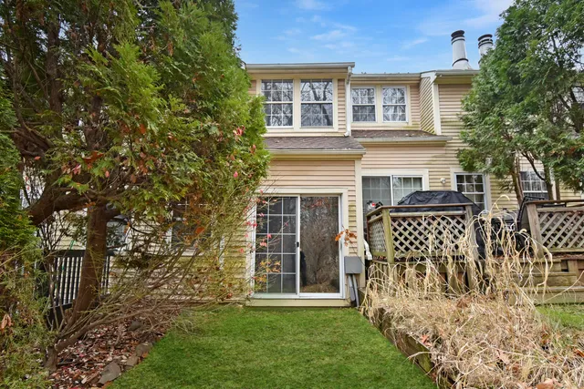 front view of a house with a garden