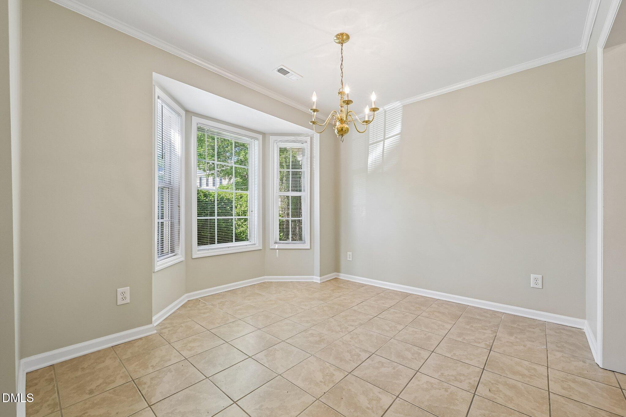 278 South Raleigh Street Angier, NC 27501 - Photo 3 of 35 a view of livingroom with window