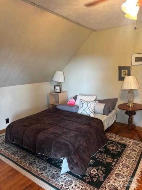 2491 Watts Street Morganton, NC 28655 - Photo 12 of 15 a bedroom with a bed lamp and a table