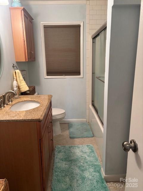 2491 Watts Street Morganton, NC 28655 - Photo 7 of 15 a bathroom with a sink a toilet and mirror