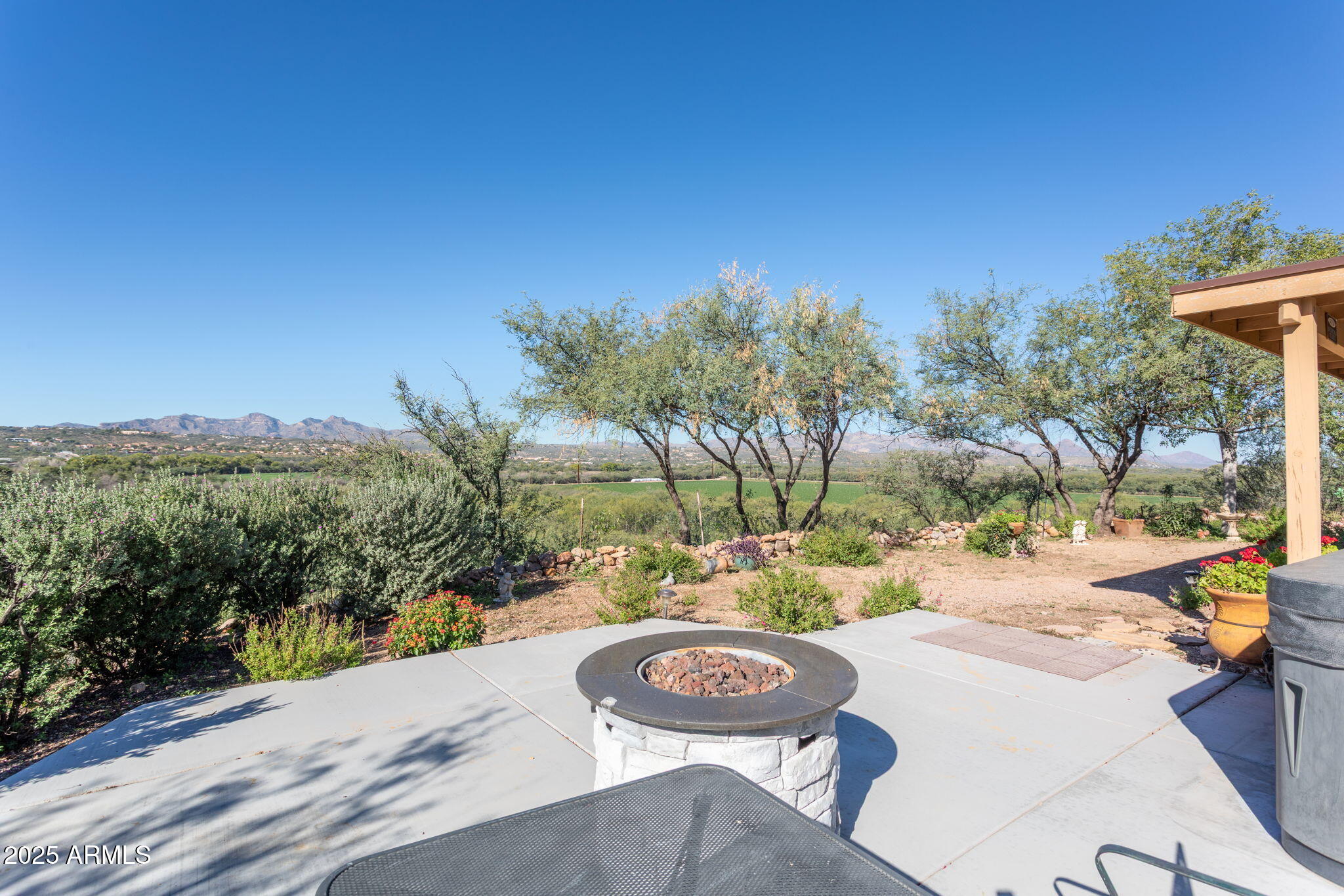 418 Cancun Court Rio Rico, AZ 85648 - Photo 24 of 36 a view of a backyard of a house