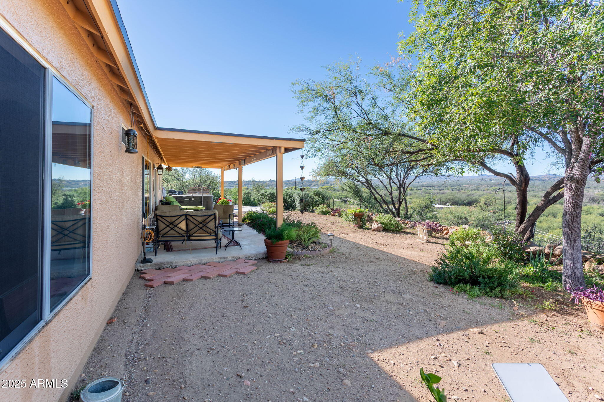 418 Cancun Court Rio Rico, AZ 85648 - Photo 29 of 36 a view of a backyard with patio