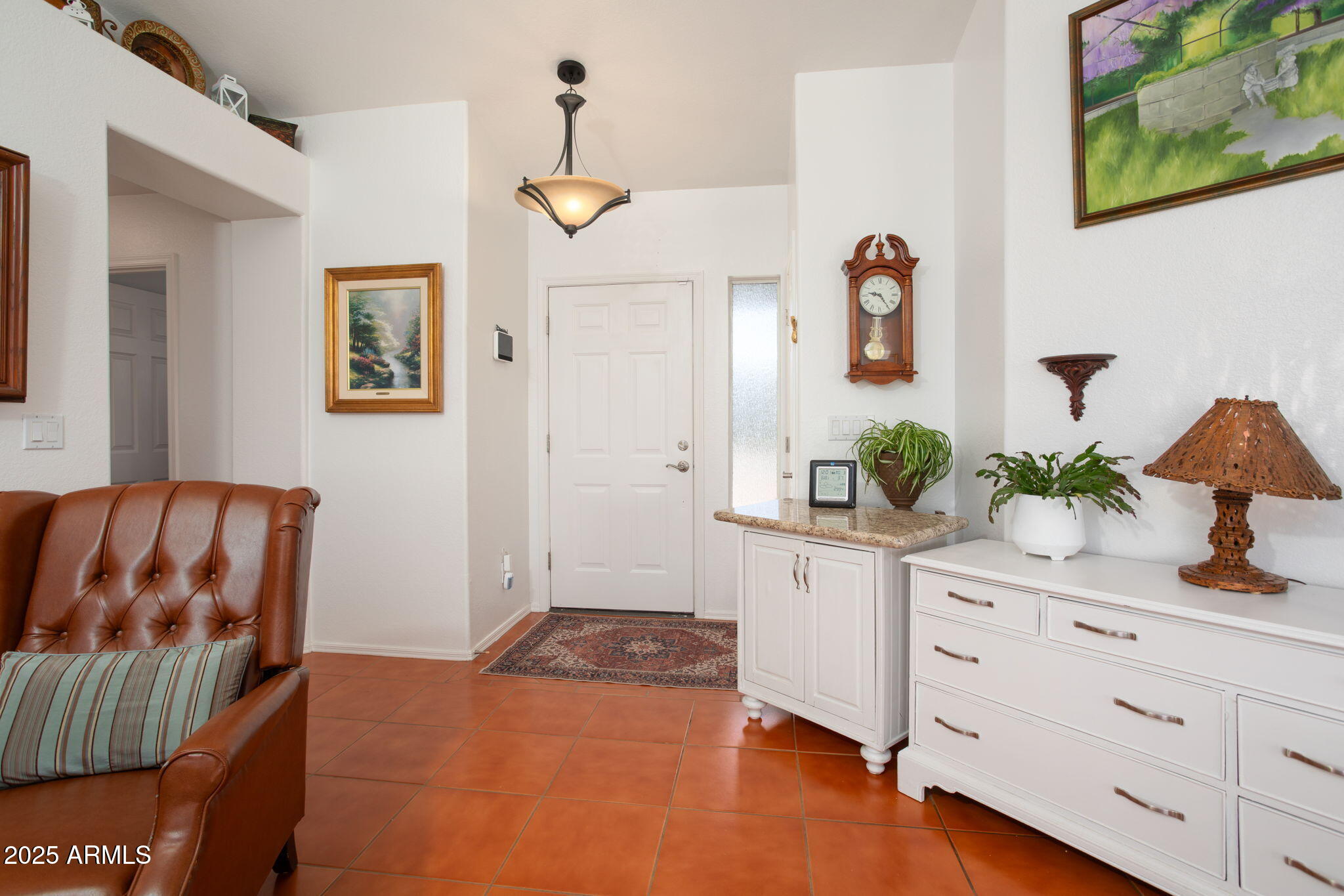 418 Cancun Court Rio Rico, AZ 85648 - Photo 6 of 36 a bedroom with a bed and a dresser in it