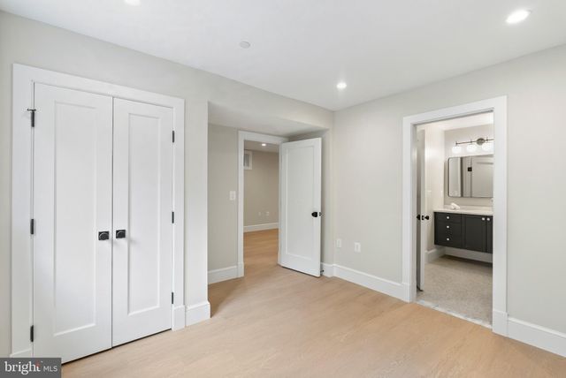 a view of a bathroom with a sink and a mirror