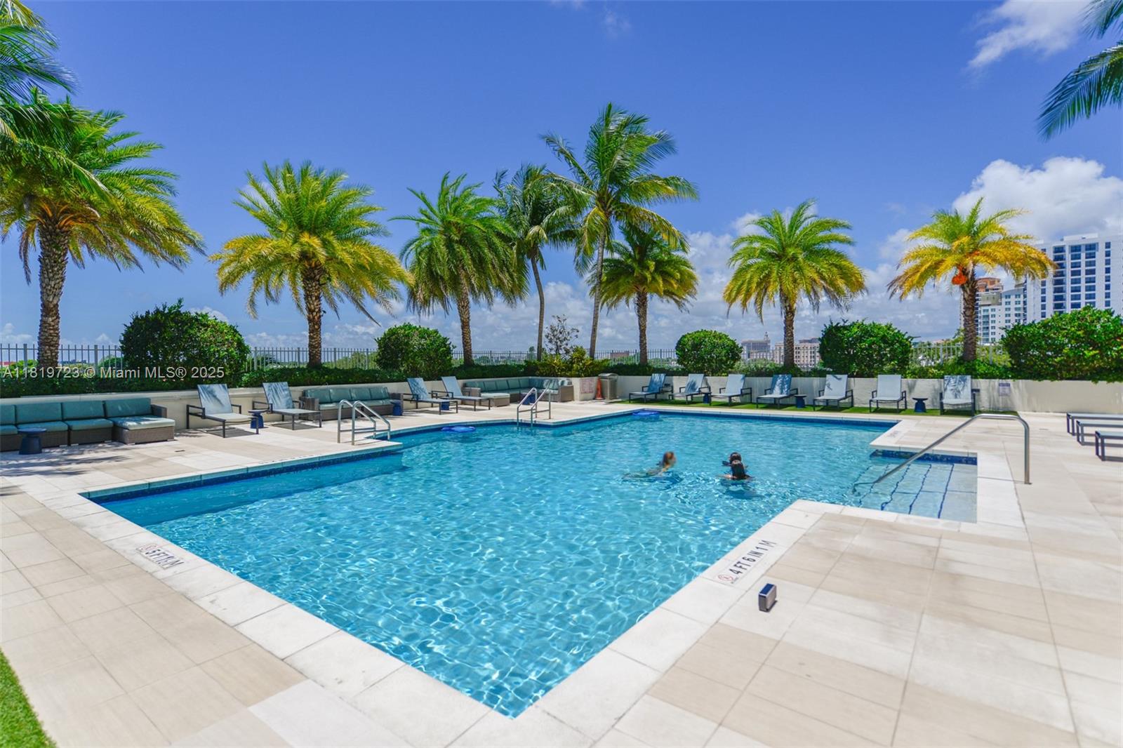 3000 Coral Way, Unit 1208 Miami, FL 33145 - Photo 29 of 35 a view of a swimming pool and a chair