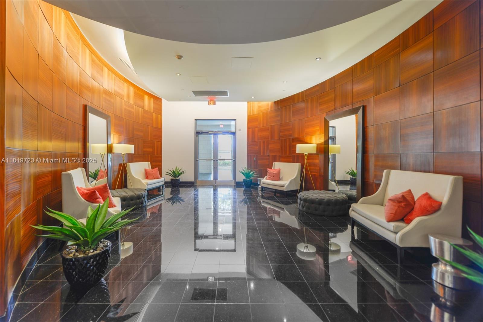 3000 Coral Way, Unit 1208 Miami, FL 33145 - Photo 31 of 35 a lobby with furniture and rug