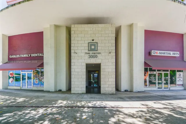 a view of a brick building with a street