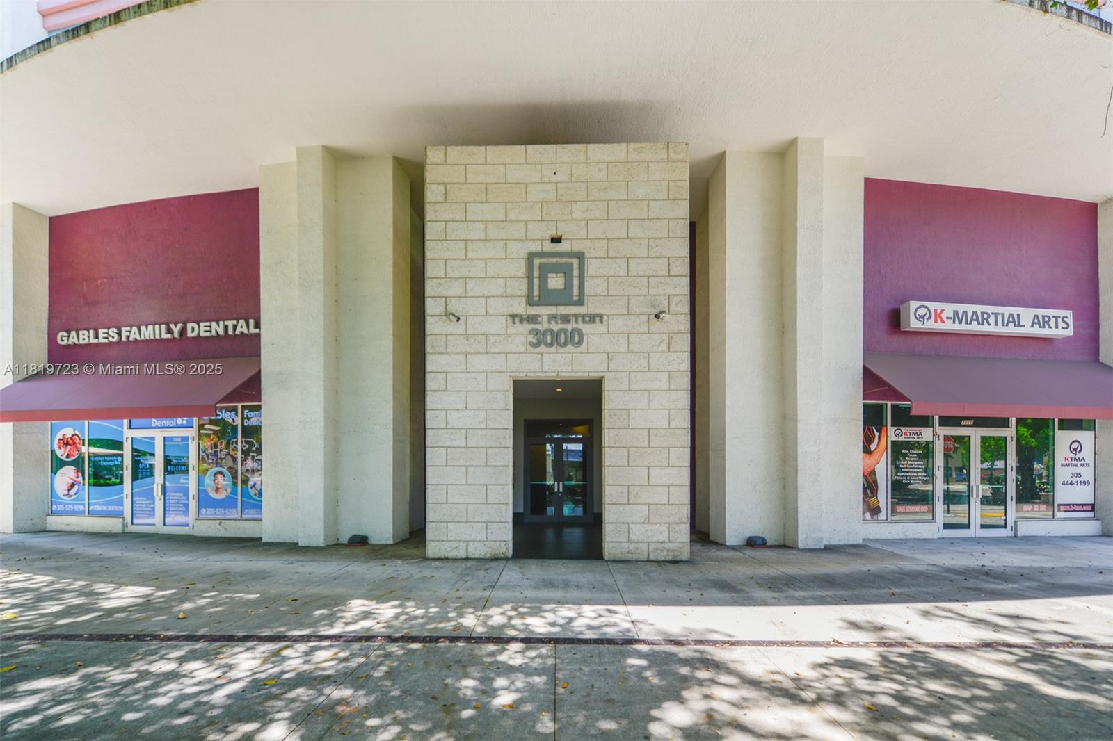 3000 Coral Way, Unit 1208 Miami, FL 33145 - Photo 33 of 35 a view of a brick building with a street