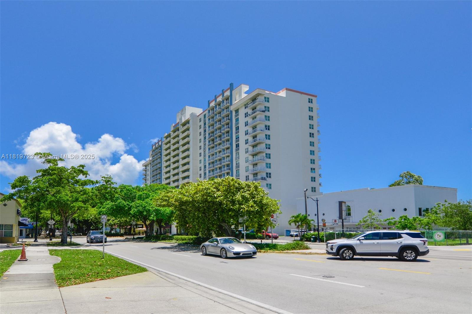 3000 Coral Way, Unit 1208 Miami, FL 33145 - Photo 35 of 35 a cars parked in front of a building