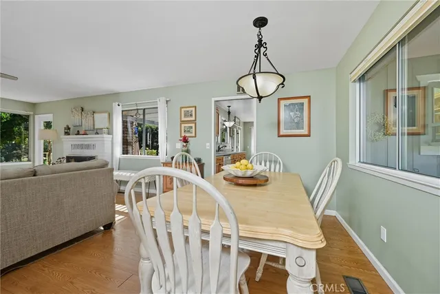 a kitchen that has a refrigerator and a stove