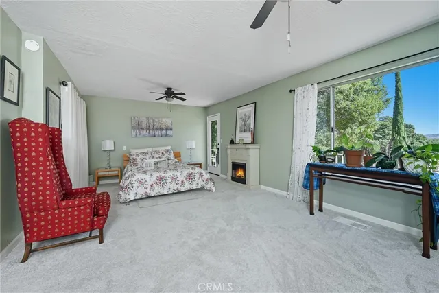 a bathroom with a sink mirror toilet and a mirror