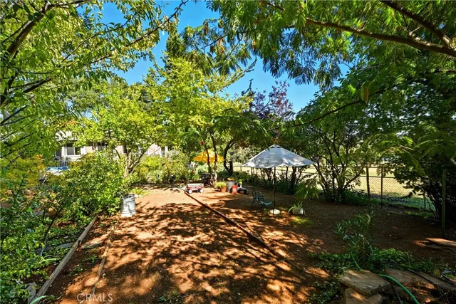 a house with trees in front of it
