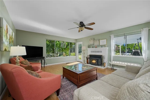 a living room with furniture or couch and a flat screen tv