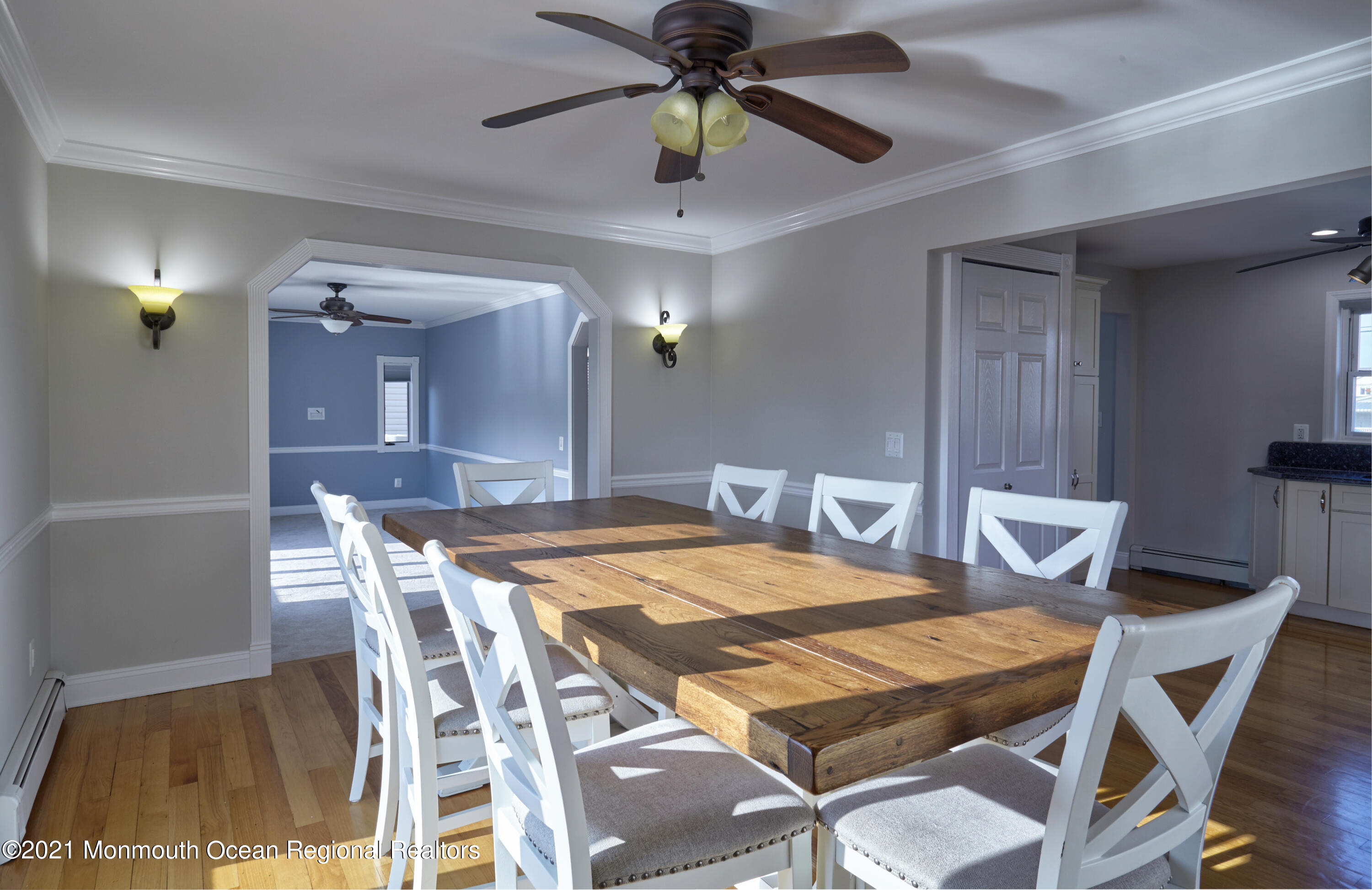 6 Topsail Road Brick, NJ 08723 - Photo 11 of 43 a view of a dining room with furniture and a chandelier
