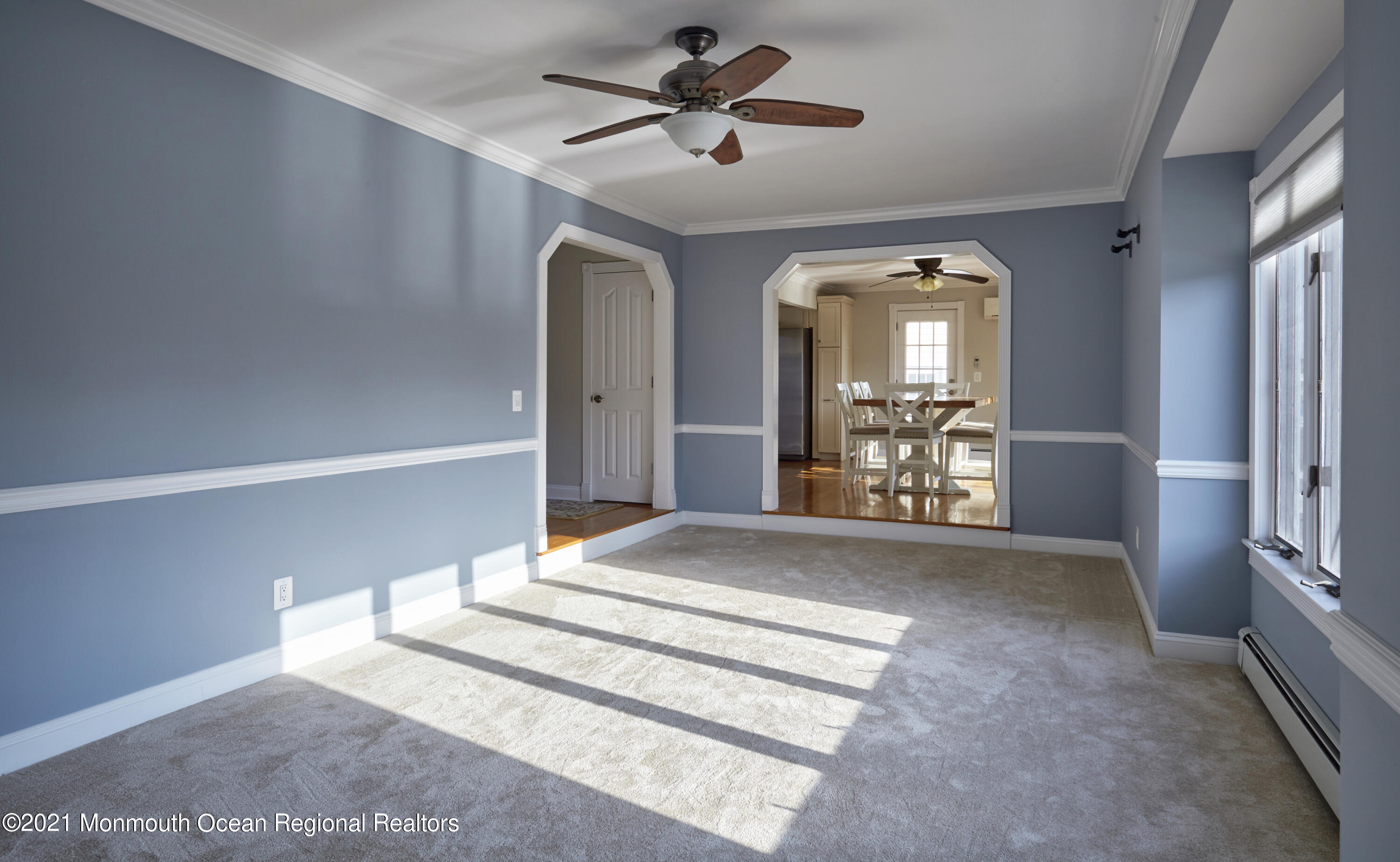 6 Topsail Road Brick, NJ 08723 - Photo 13 of 43 a view of a hallway with a chandelier fan and windows