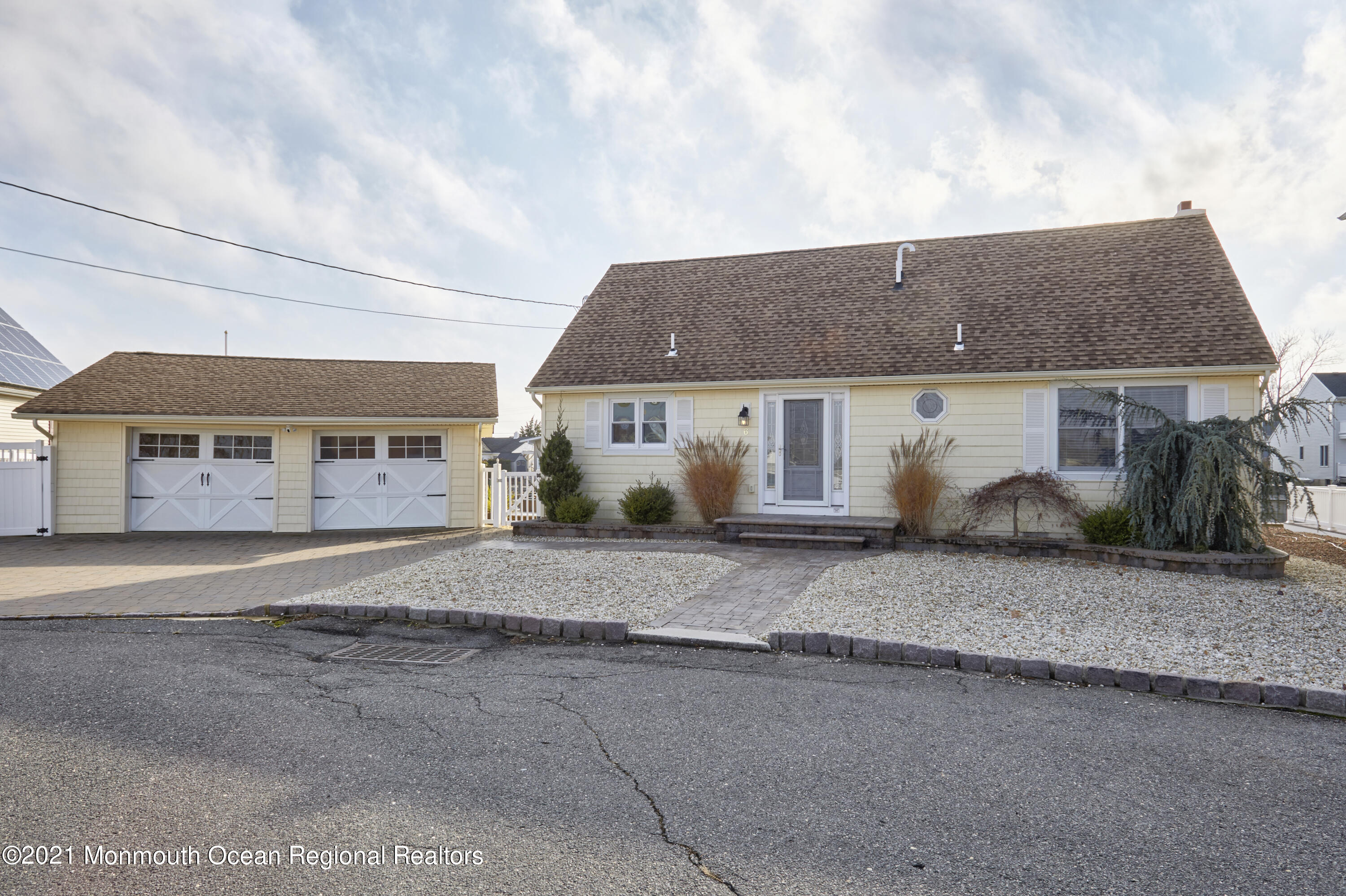 6 Topsail Road Brick, NJ 08723 - Photo 3 of 43 a front view of a house with a road