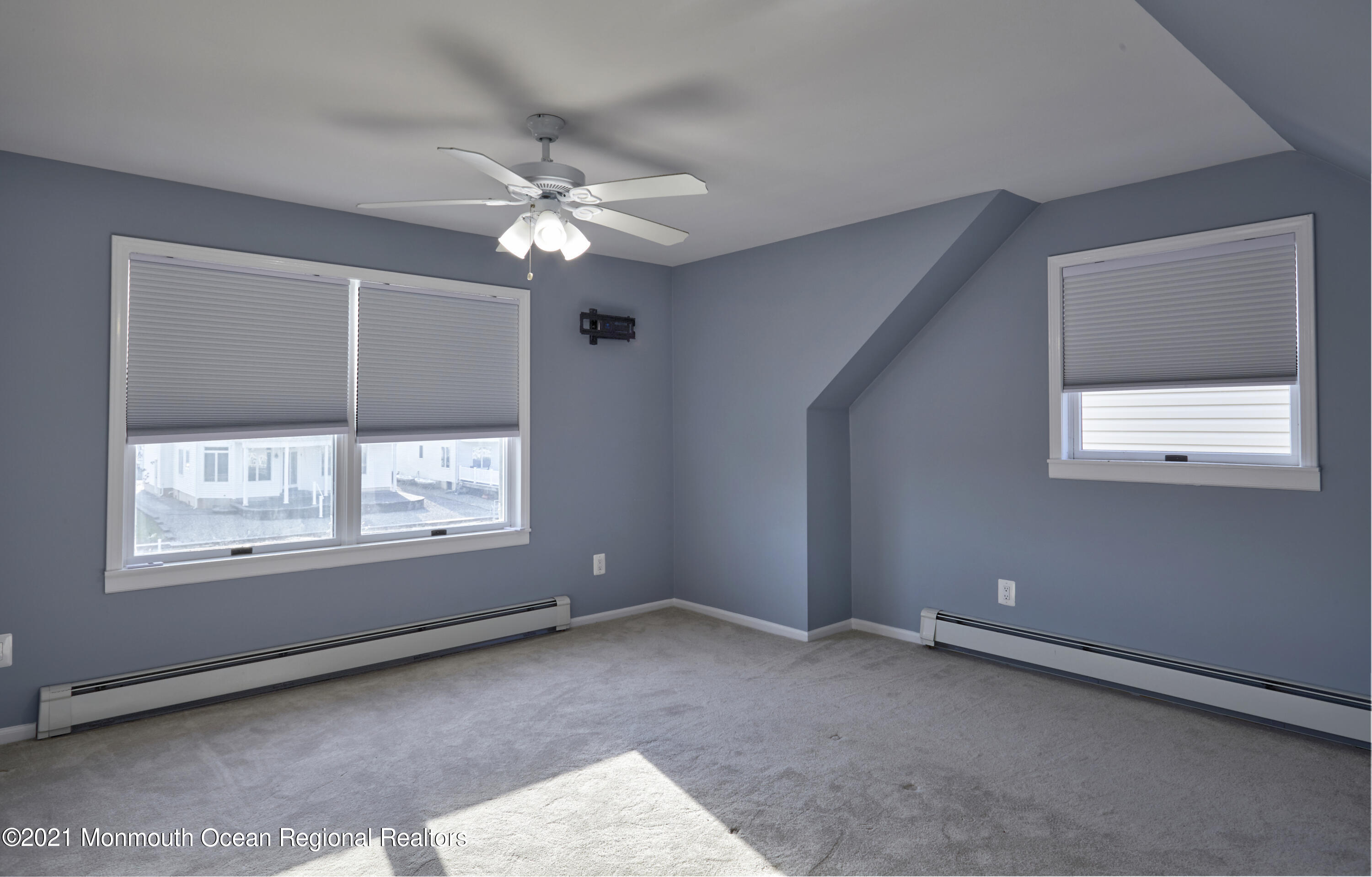 6 Topsail Road Brick, NJ 08723 - Photo 26 of 43 an empty room with a window and a fan
