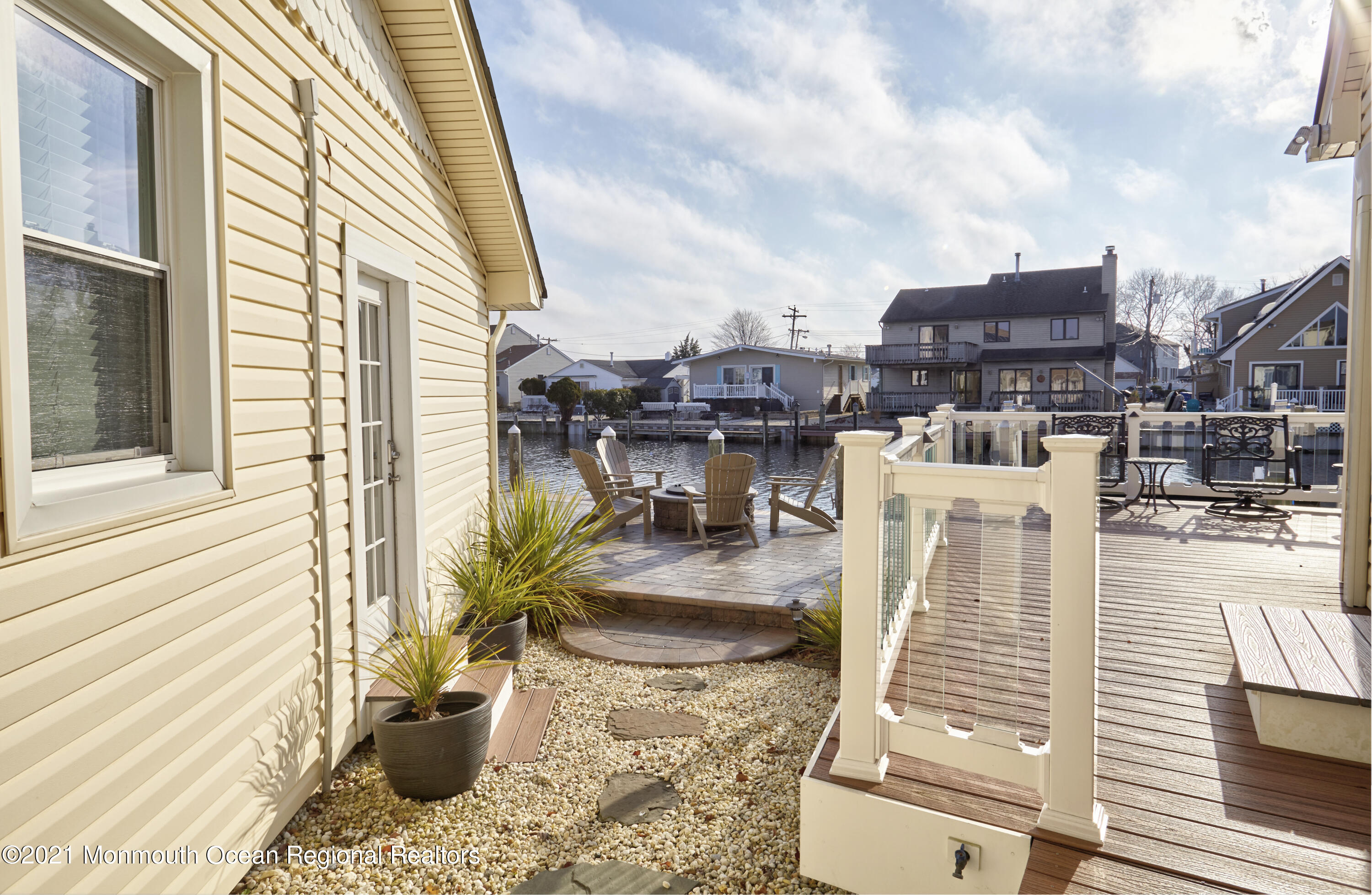 6 Topsail Road Brick, NJ 08723 - Photo 27 of 43 a view of a patio with couches and potted plants