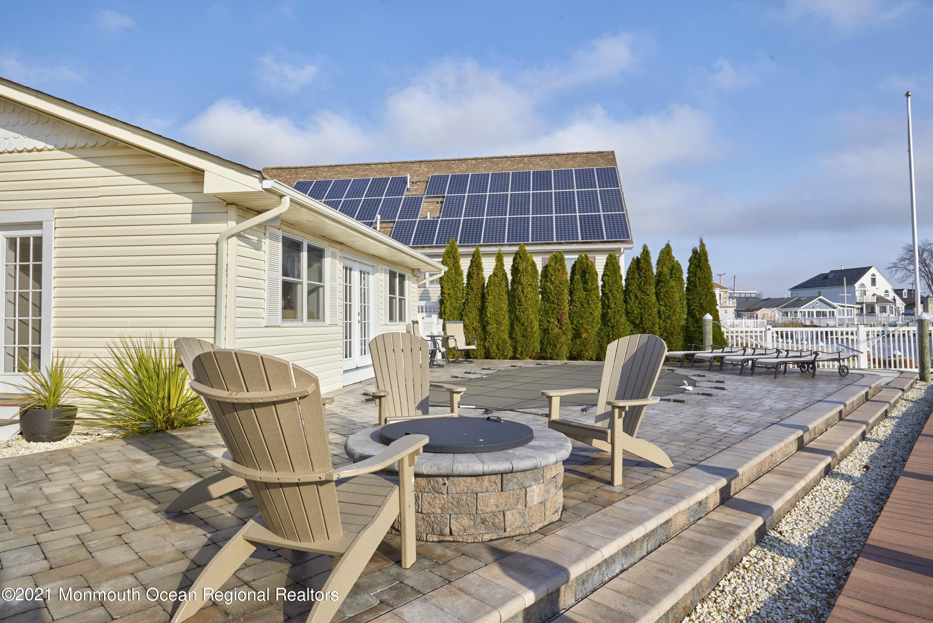 6 Topsail Road Brick, NJ 08723 - Photo 40 of 43 a view of a patio with table and chairs and potted plants