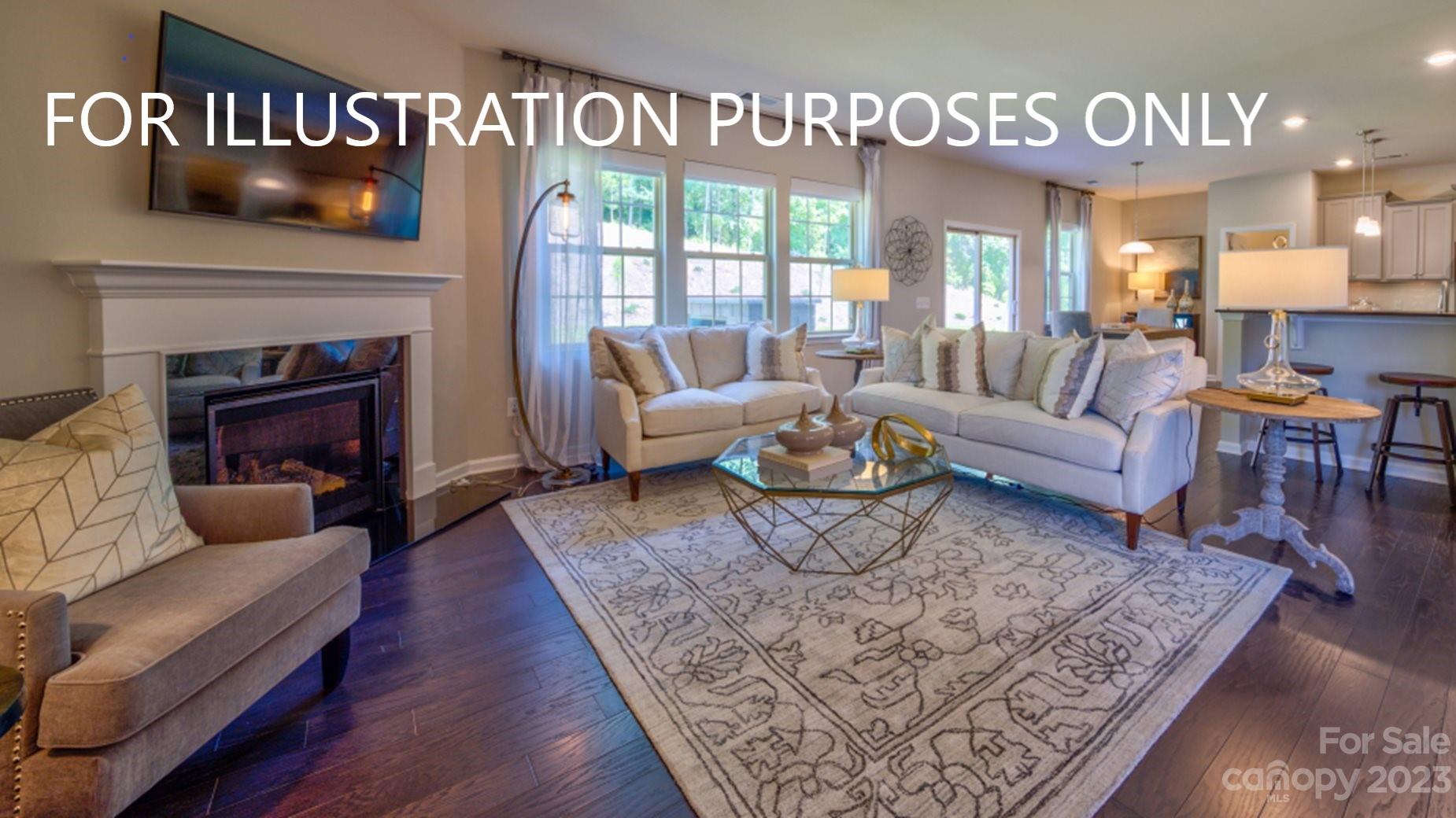 5652 Soft Shell Drive, Unit WCE 474 Lancaster, SC 29720 - Photo 3 of 11 a living room with furniture and a fireplace