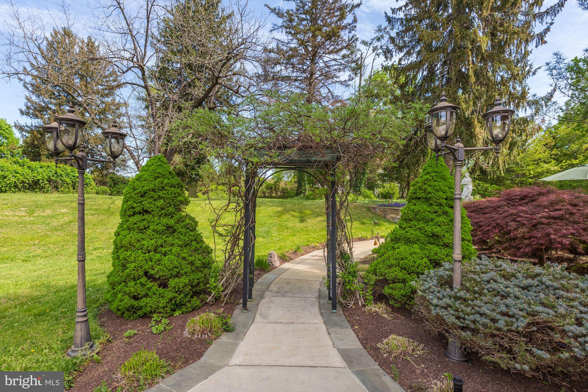 9511 River Road Potomac, MD 20854 - Photo 45 of 48 Path from driveway to backyard
