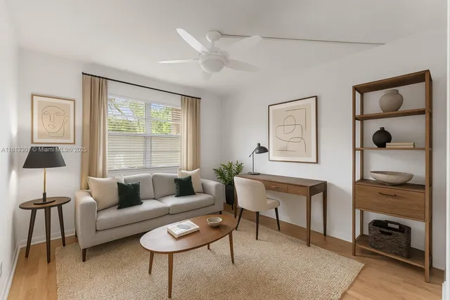 a living room with furniture and a window